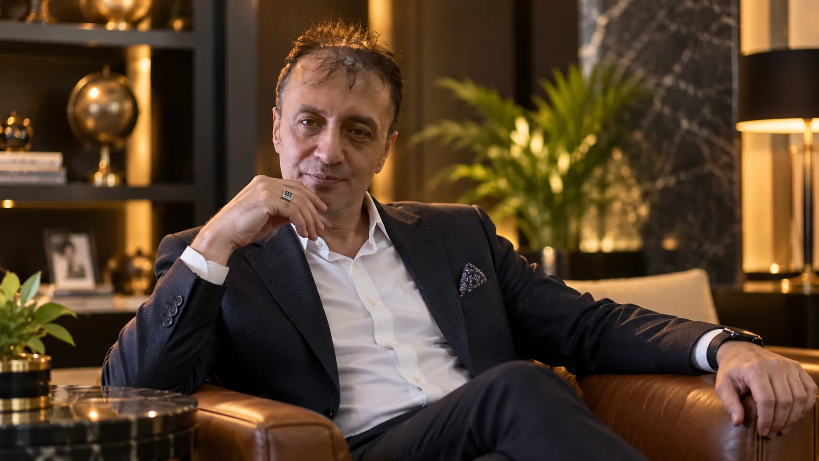 Digital editorial portrait of Prof. Dr. Bilal Semih Bozdemir in a refined executive lounge, founder of PressGrup Digital Platforms